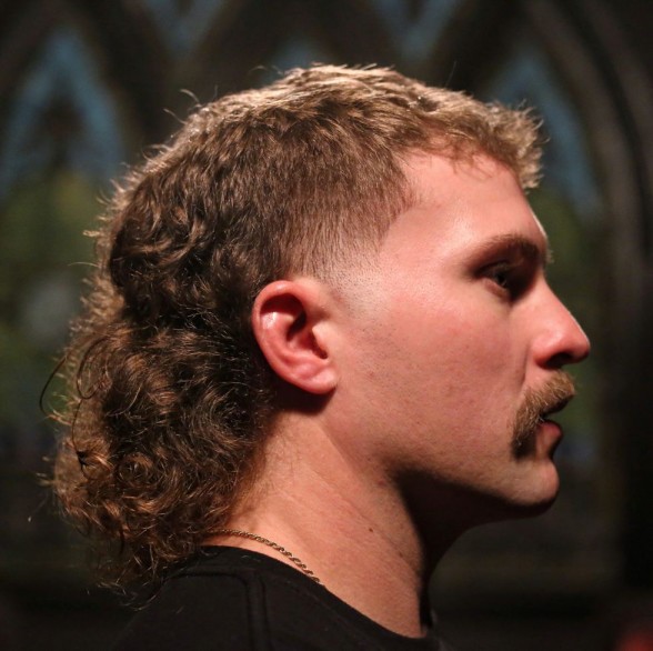 How do you grow a mullet with curly hair?