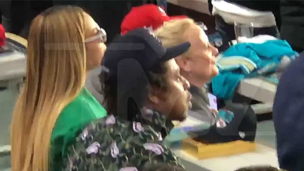Beyonce, Jay-Z & Blue Ivy Sit Down During Super Bowl National Anthem